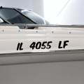Custom Boat Registration Numbers (2 - Pack) - Rising Sun Decals - White boat with registration decal on a white background