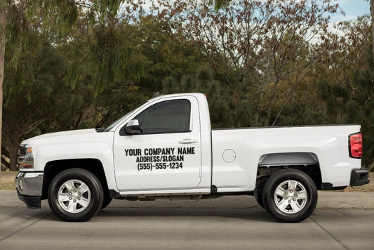 Custom Business Vinyl Decal Large Format Sticker For Truck/Car/Van - Rising Sun Decals - White pickup truck with customizable text on a road with trees in the background